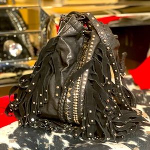 1 OF A KIND FIND! ROCKSTAR BAG. THIS BANGED UP BEAUTY OS STILL FAB, FLAWS & ALL!